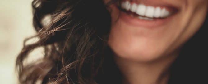 Woman with white teeth smiling